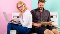 Students spend leisure studying. Couple students with book and laptop studying. Man and woman use different learning Royalty Free Stock Photo