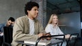 Students study in classroom group young happy people sitting at desk at lesson listening to lecture learning new topic