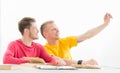 Students take a selfie picture in a classroom