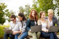 Students or teenagers with laptop computers Royalty Free Stock Photo