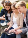 Students or teenagers with laptop computers Royalty Free Stock Photo