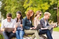 Students or teenagers with laptop computers Royalty Free Stock Photo