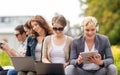 Students or teenagers with laptop computers Royalty Free Stock Photo