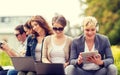 Students or teenagers with laptop computers Royalty Free Stock Photo