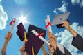 Students throwing graduation hats