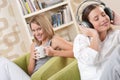 Students - Two female teenager relaxing in lounge