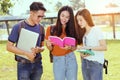 Students university asian together reading book Royalty Free Stock Photo