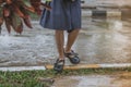 Students walk to the flood after rain Royalty Free Stock Photo