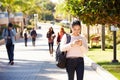 Students Walking Outdoors On University Campus Royalty Free Stock Photo