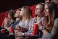 Students watching movie in modern cinema hall Royalty Free Stock Photo