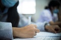 Students wearing mask for protect corona virus or covid-19 and doing exam in classroom with stress Royalty Free Stock Photo