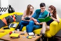 Students working on the couch Royalty Free Stock Photo