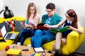 Students working on the couch Royalty Free Stock Photo