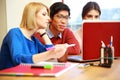 Students working on laptop together Royalty Free Stock Photo