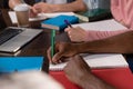 Students writing in copybooks Royalty Free Stock Photo