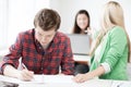 Students writing something at school Royalty Free Stock Photo