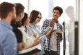 Students writing tasks on whiteboard in class Royalty Free Stock Photo