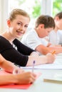 Students writing a test in school concentrating Royalty Free Stock Photo