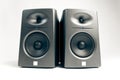 Studio audio monitors on white