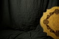 Studio backdrop with old wooden medallion