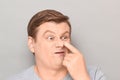 Portrait of funny man grimacing and making goofy crazy face Royalty Free Stock Photo