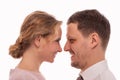 Studio close up portrait of a positive smiling man and woman people looking at each other with love Royalty Free Stock Photo