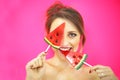 Studio closeup colorful portrait of young funny fashion girl posing on blue pink background in summer style outfit