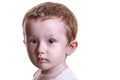 Studio closeup portrait of little baby boy with serious face loo Royalty Free Stock Photo