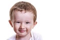 Studio closeup portrait of little baby boy smiling and looking h Royalty Free Stock Photo