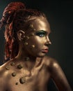 Studio conceptual female bronze beauty portrait Royalty Free Stock Photo