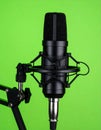 Studio Condenser Microphone on Green Screen Background Royalty Free Stock Photo