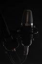 Studio condenser microphone isolated on black background. Music concept. Sound maker studio Royalty Free Stock Photo