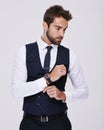 Studio, confident and man in suit for fashion, stylish and luxury for aesthetic of glamour and classic. Adult, guy and Royalty Free Stock Photo