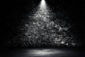 Studio dark room black brick wall and spotlight with concrete floor grunge texture background. Royalty Free Stock Photo