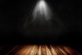 Studio dark room of Wooden floor and spotlight for product showing. Royalty Free Stock Photo