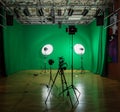 Studio for filming on a green background. The chroma key. Lighting equipment in the Studio. Green screen Royalty Free Stock Photo