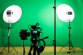 Studio for filming on a green background. The chroma key. Lighting equipment in the Studio. Green screen Royalty Free Stock Photo