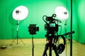 Studio for filming on a green background. The chroma key. Lighting equipment in the Studio. Green screen Royalty Free Stock Photo