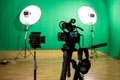 Studio for filming on a green background. The chroma key. Lighting equipment in the Studio. Green screen Royalty Free Stock Photo