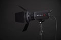 Studio flash is a pulsed light source on black background. Jinbei EF2 100 LED