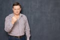 Portrait of angry annoyed man raising hand with clenched fist Royalty Free Stock Photo