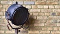 studio lamp against the background of a brick wall. color Royalty Free Stock Photo