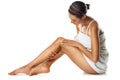 Studio, legs and body of woman on floor with skincare, spa beauty and self care marketing mockup. Dermatology, aesthetic