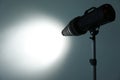 Studio lighting against gray background. Royalty Free Stock Photo