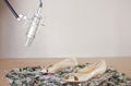 Studio Microphone and Female shoes over broken glass Royalty Free Stock Photo