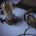 Studio microphone, headphones, speakers and computer. Home studio recording for sound mixing, sound design and music production Royalty Free Stock Photo