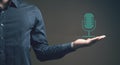 studio microphone. man holding in his hand Royalty Free Stock Photo