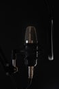 Studio Microphone or mic for recording for vocal singer n acoustic foam room for best sound isolated on black background. Music Royalty Free Stock Photo