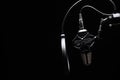 Studio microphone with pop filter with dramatic light. Concept. Leading radio, bloggers, singers, track recording, voice acting
