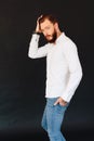 Studio photo of a beautiful young man with a beard Royalty Free Stock Photo